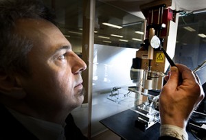 Professor Dietmar Hutmacher with a 3D-printed scaffold Image credit: www.qut.edu.au