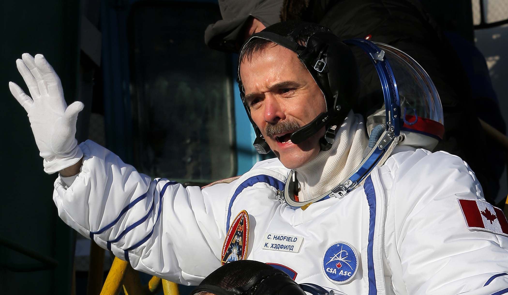 Canadian astronaut Chris Hadfield, a crew member of the mission to the International Space Station, gestures prior to the launch of the Soyuz-FG rocket at the Russian leased Baikonur cosmodrome inKazakhstan, December 19, 2012. (Dmitry Lovetsky/Associated Press) Provided image