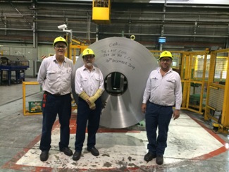 Jan Smith, Les O’Brien and Tim Simmonds pictured with the last coil produced at Point Henry. Les and Tim had the honour of running both the first and last coil on the line. Image credit: Alcoa website