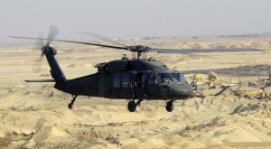 A US Army (USA) UH-60L Black hawk Helicopter flies a low-level mission over Iraq during Operation IRAQI FREEDOM.