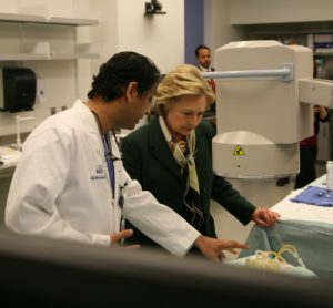 Hillary Clinton examining vascular model produced on a Stratasys Objet500 Connex3 3D Printer with Dr. Adnan H. Siddiqui, Chief Medical Officer, The Jacobs Institute Image credit: www.businesswire.com