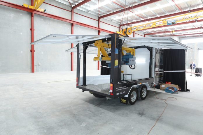 A scaled-down but fully functional mobile Demag V-type crane will be taken to key cities on a roadshow