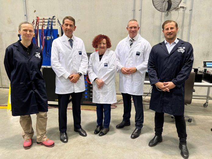 Queensland Treasurer Cameron Dick and Energy Minister Mick de Brenni with some of the National Battery Testing Centre team.